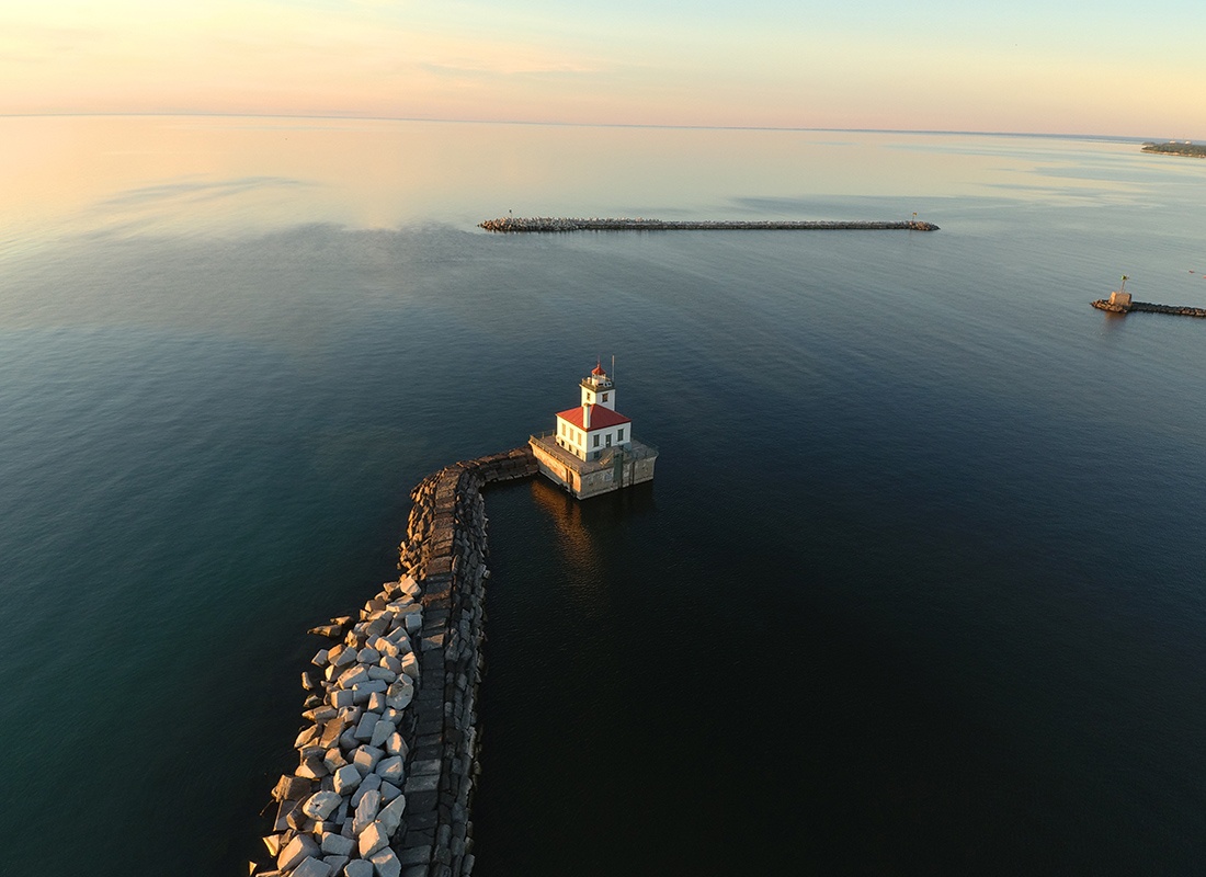 Contact - Aerial View of Oswego Harbor West Pierhead Lighthouse at Lake Ontario, Oswego, New York