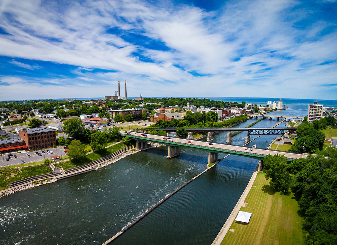 Oswego, NY - Aerial View of Bridges Crossing a River in Oswego, NY