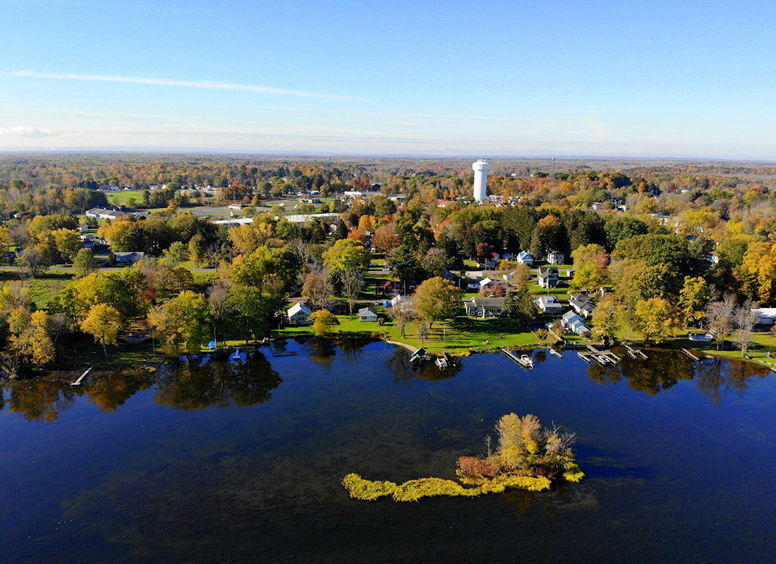 We are Independent - Aerial View of the Waterfront Residential Area by Oneida Lake With Stunning Fall Foliage Near Syracuse, New York