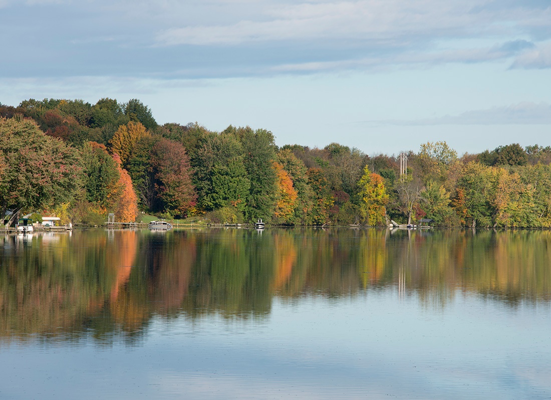 Read Our Reviews - Early Fall Morning Reflections on the Oswego Canal